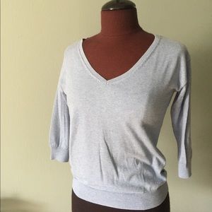 Light blue v-neck cotton & spandex top.